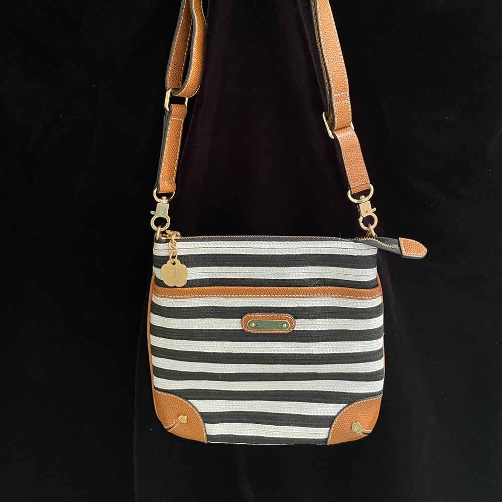 Never carried!  Eric Javier’s crossbody